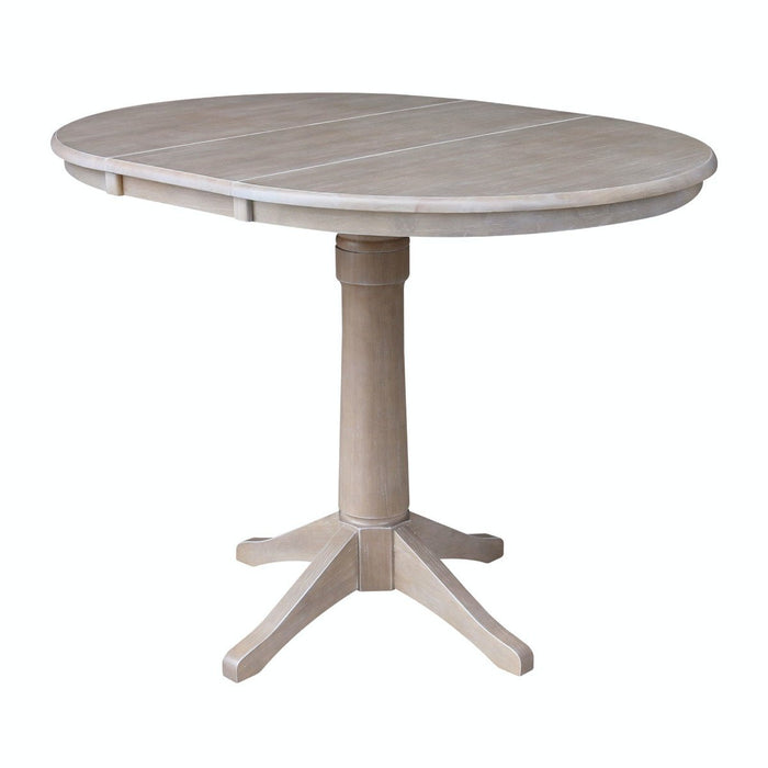 John Thomas Dining Essentials Round Extension Table in Taupe Gray image